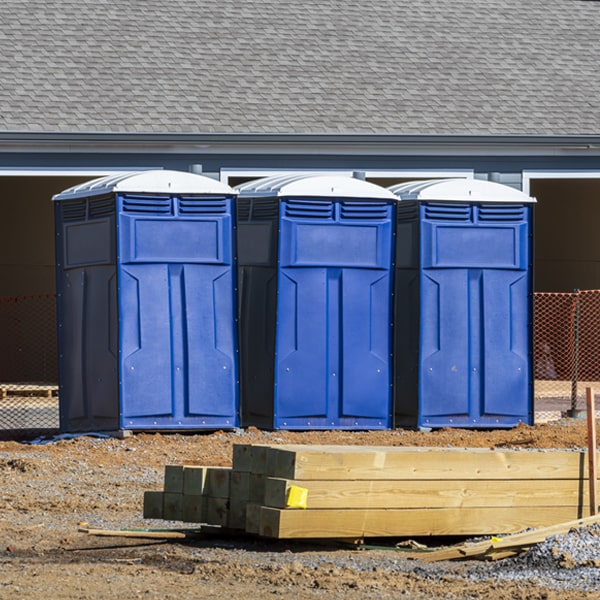 what is the cost difference between standard and deluxe portable restroom rentals in Rosemont